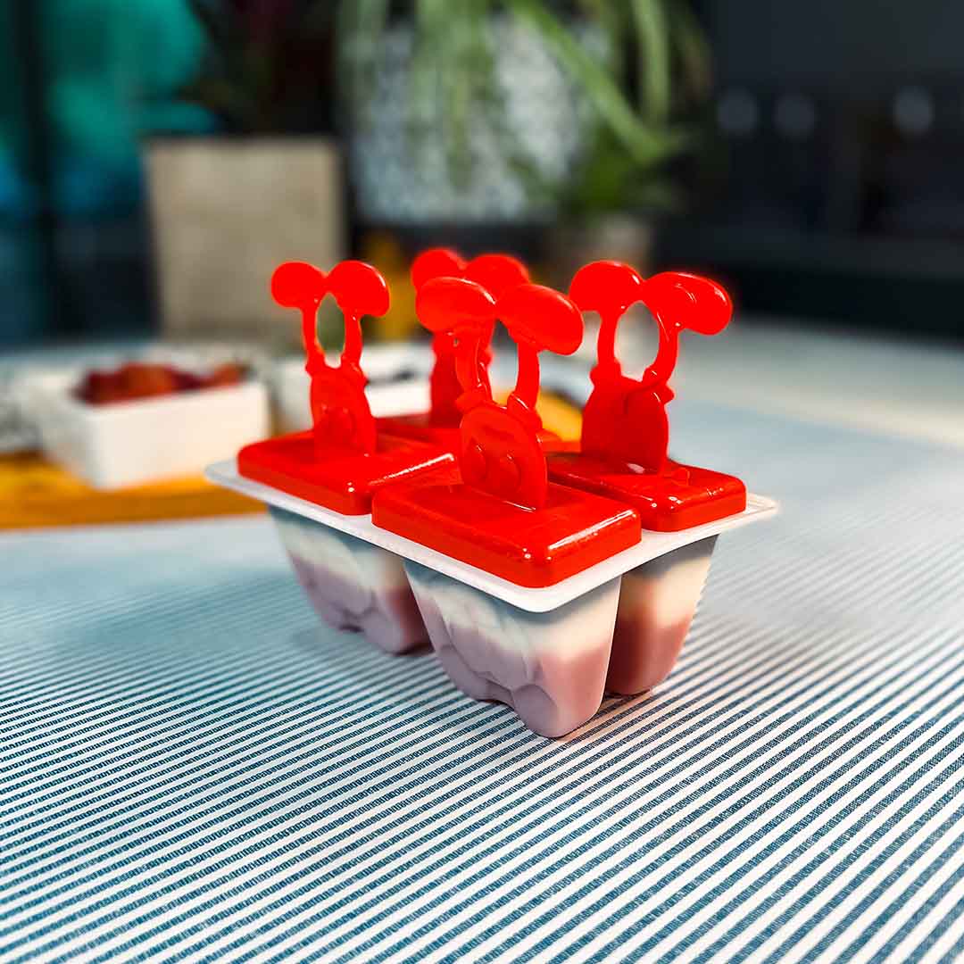 Popsicle mold with three different ingredient layers