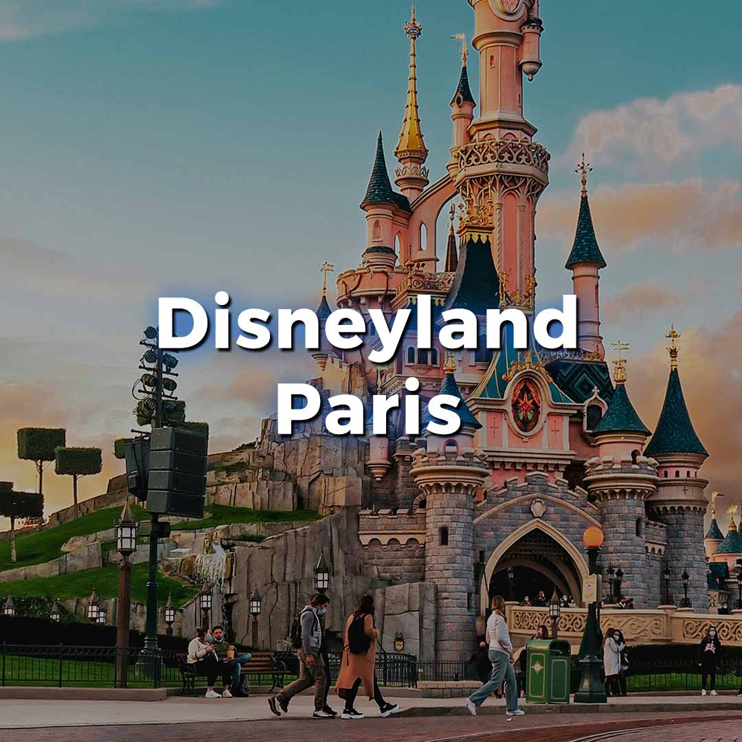 Disneyland Paris Sleeping Beauty Castle with text overlay "Disneyland Paris". Image is a link to the MouseWatcher page for Disneyland Paris restaurants.